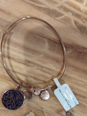Alex and Ani Rose Gold Bracelet with Blue Sparkle Initial Charm